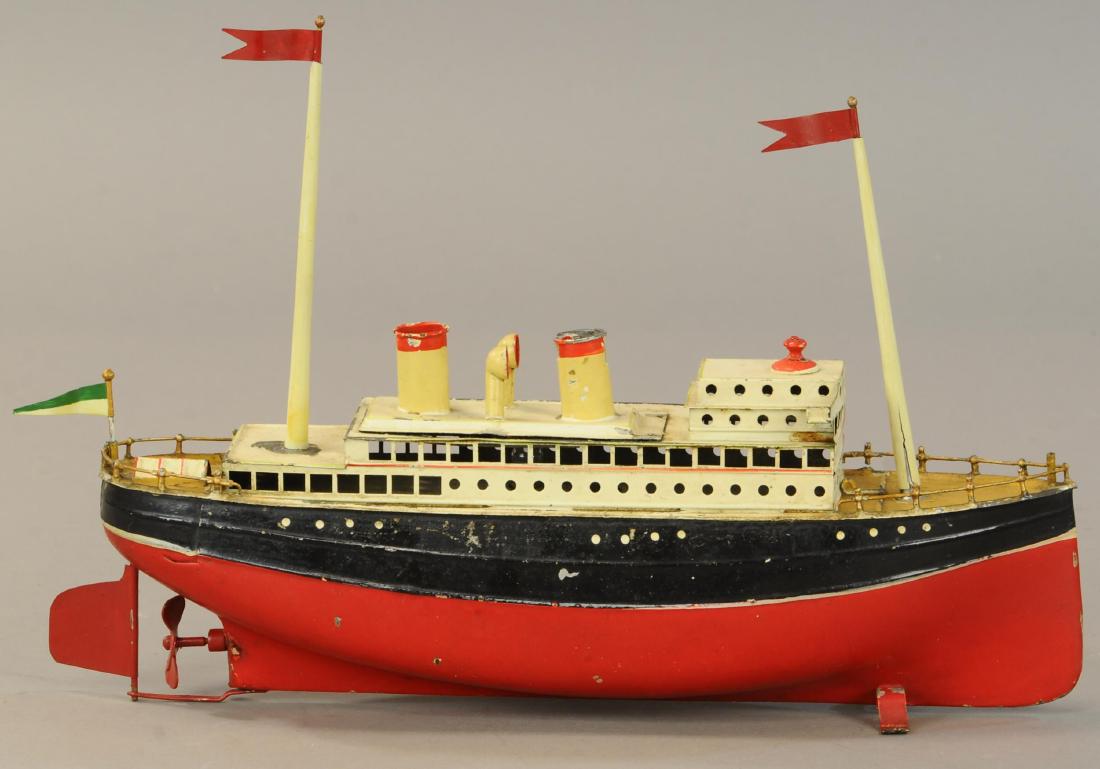 SMALL FLEISCHMANN OCEAN LINER: 1361. SMALL FLEISCHMANN OCEAN LINER | Wind-up motor with a battery powered light to illuminate interior, has original masts. | 13" l. | Front mast sleeve reattached to deck, rudder and propeller possi