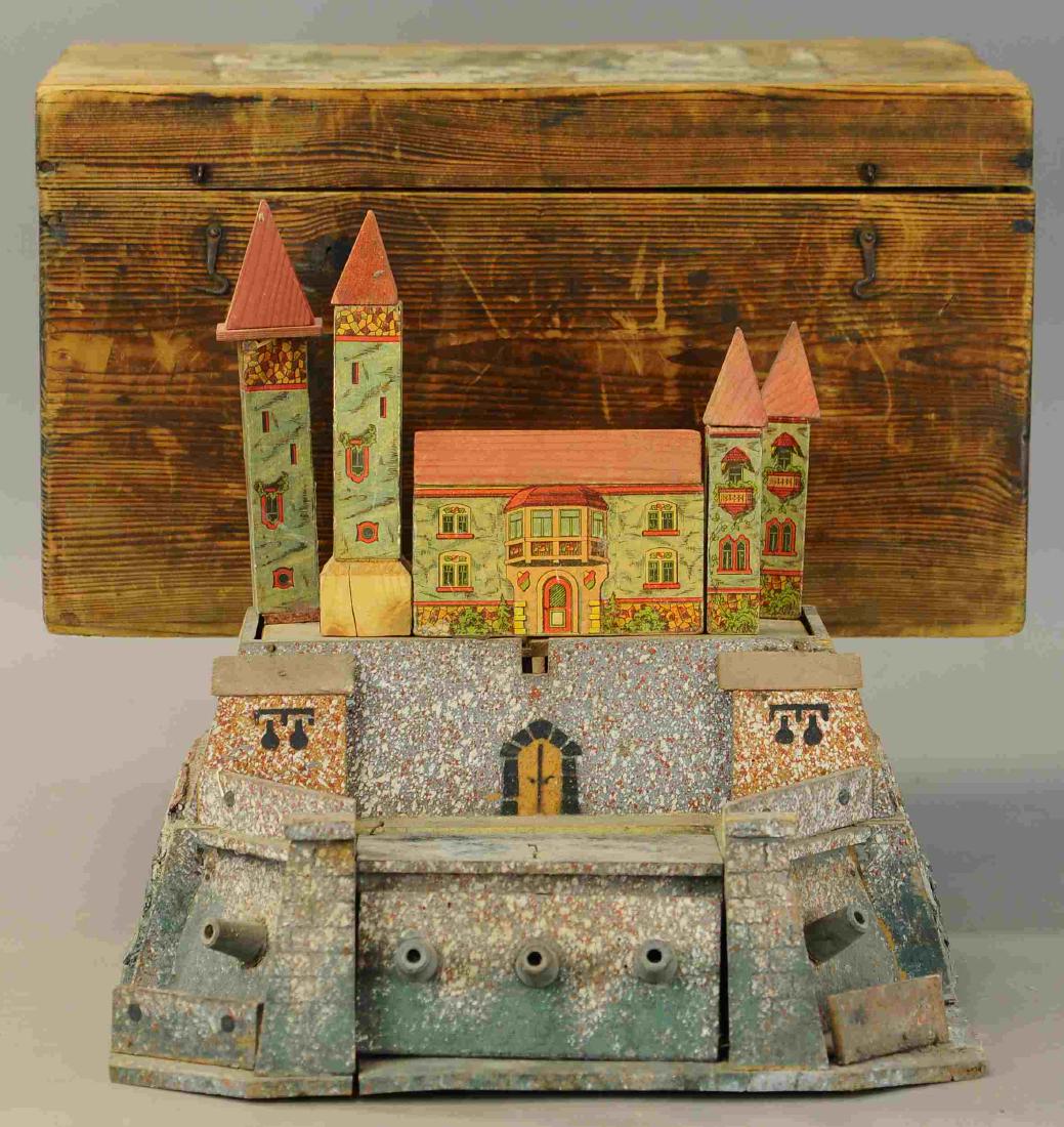 BOXED EXPLODING SOLDIER FORT: 1371. BOXED EXPLODING SOLDIER FORT | Carl Moritz Reichel | 15" l. | Working in (VG Cond.) | $1,000 - $1,500