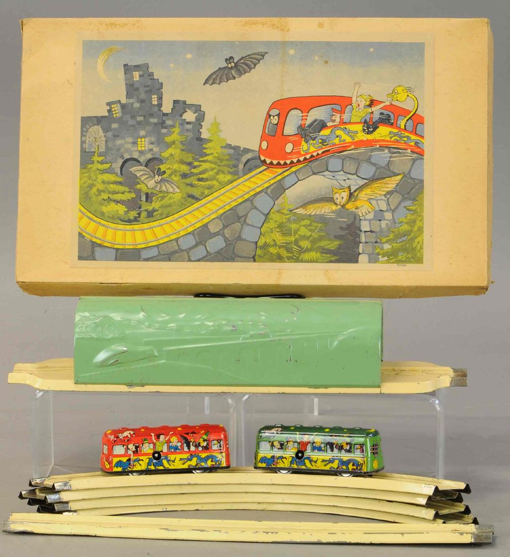 1920'S WIND-UP HALLOWEEN TRAIN: 1372. 1920'S WIND-UP HALLOWEEN TRAIN | Pre-war Germany, two wind-up cars with ghost, devils, owls, black cats and other scary figures, good working condition w/track and still in original box, complet