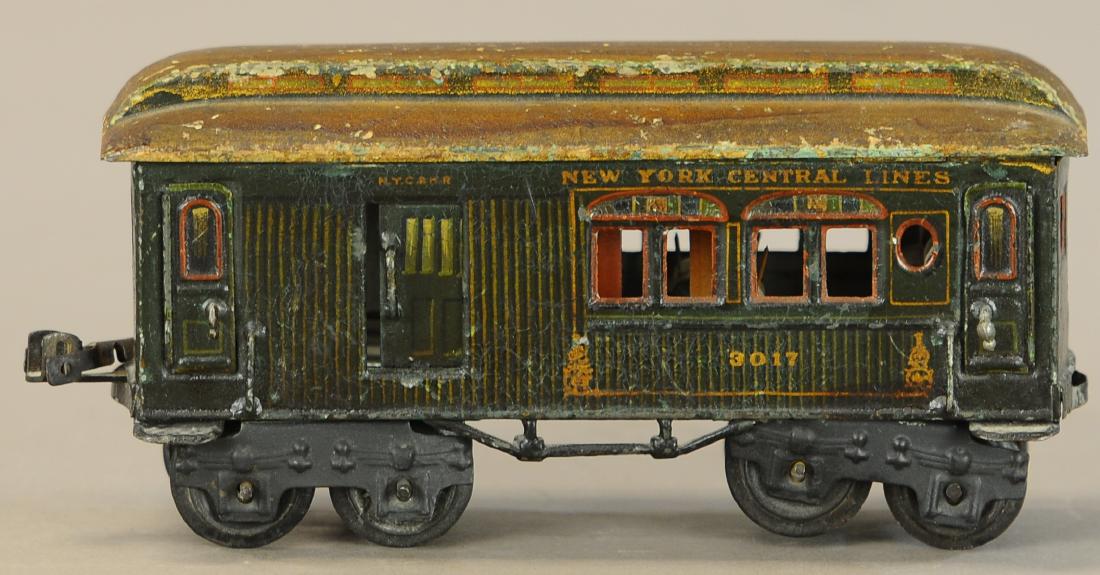 EARLY HANDPAINTED MARKLIN NYC COMBINE CAR: 1378. EARLY HANDPAINTED MARKLIN NYC COMBINE CAR | O gauge, New York Central Lines, c. 1907-1908. | 7" | Missing one coupler, paint heavily crazed in (VG Cond.) | $600 - $800