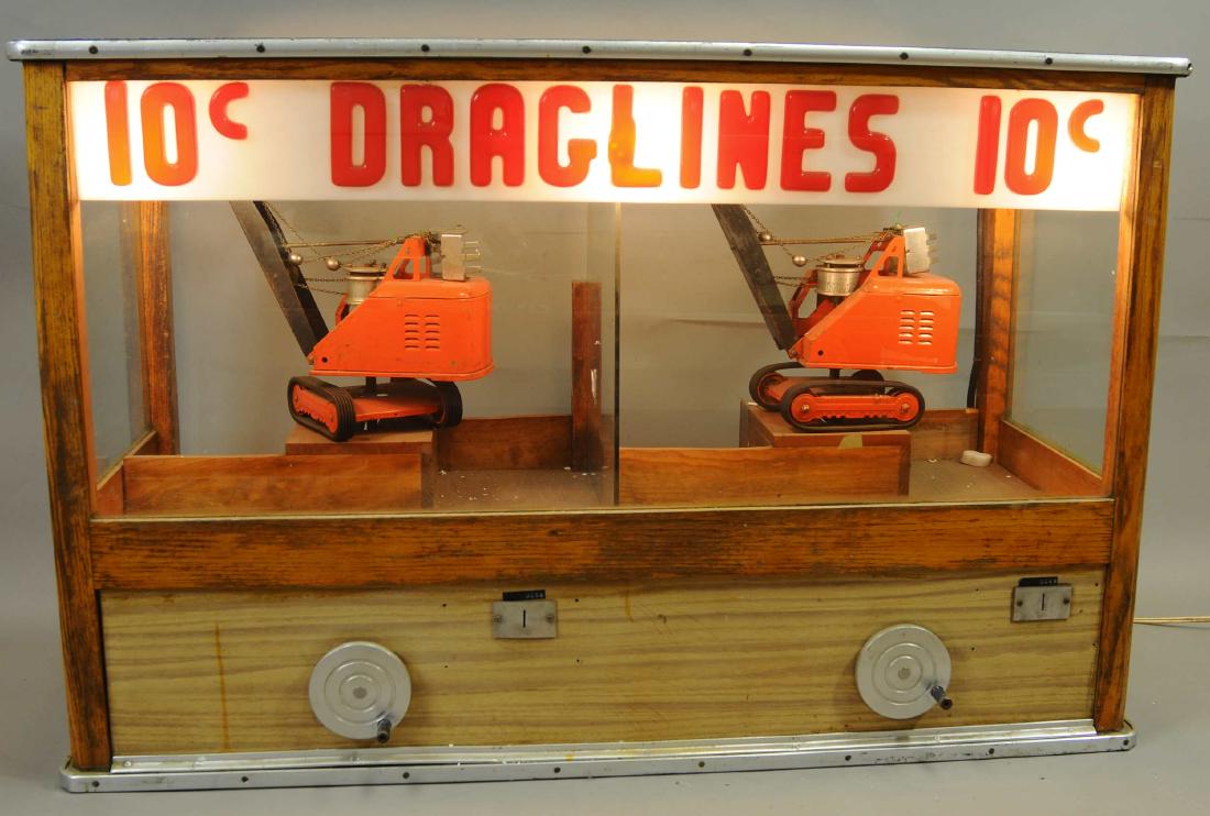 10 CENT DRAGLINES AMUSEMENT MACHINE: 1476. 10 CENT DRAGLINES AMUSEMENT MACHINE | Original arcade steam shovel carnival game, 1940's or 1950's, possibly built into a counter where the prizes and money were extracted from the back, electri
