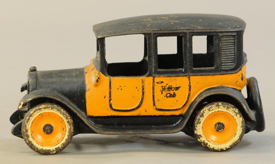 LARGE ARCADE YELLOW CAB TAXI: 1082. LARGE ARCADE YELLOW CAB TAXI | 9" | Missing mesh radiator grill and driver figure, paint in All Original Condition. | $200 - $400