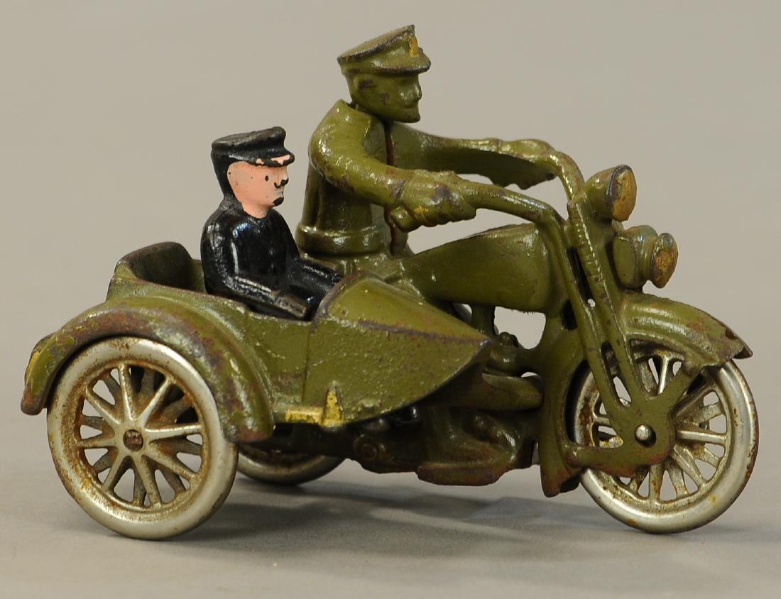 HUBLEY HARLEY CYCLE W/ SIDECAR: 1096. HUBLEY HARLEY CYCLE W/ SIDECAR | 5.5" l. | Original Hubley passenger figure is incorrect for this bike, paint in All Original Condition. | $200 - $400