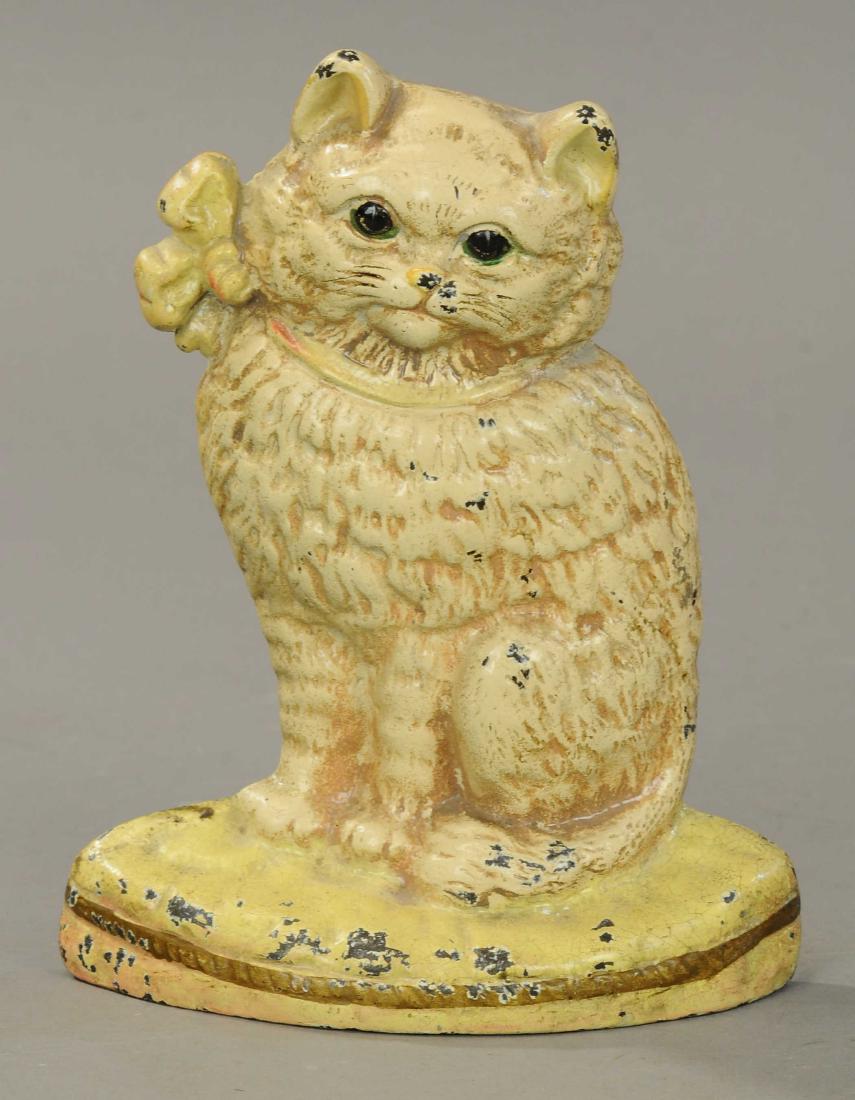 SEATED CAT DOORSTOP: 1169. SEATED CAT DOORSTOP | 7.75" h. | All Original Condition. | $75 - $150
