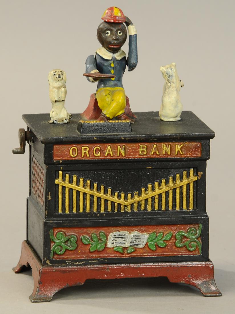 ORGAN MECHANICAL BANK CAT & DOG: 1187. ORGAN MECHANICAL BANK CAT & DOG | Crank & trap replaced, crack at base, repainted. | $150 - $300