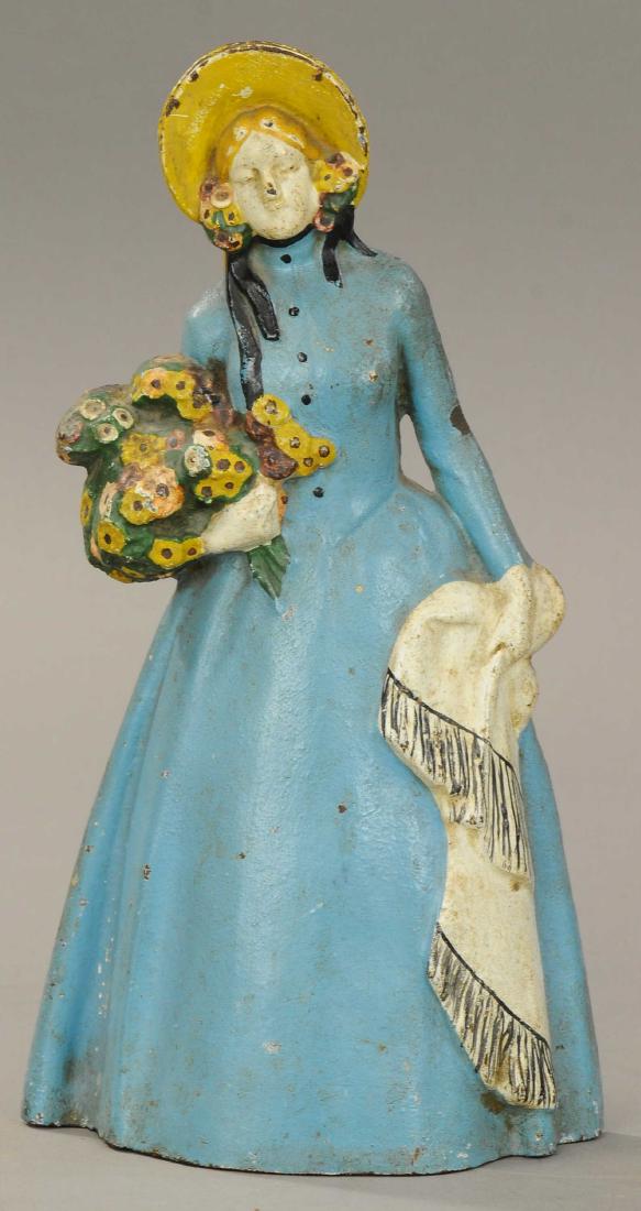 COLONIAL WOMAN DOORSTOP: 1231. COLONIAL WOMAN DOORSTOP | 12" h. | All Original Condition. | $100 - $200