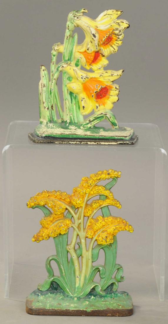 HUBLEY GOLDENROD & JONQUIL FLORAL DOORSTOPS: 1240. HUBLEY GOLDENROD & JONQUIL FLORAL DOORSTOPS | 6.75" - 7" h. | All Original Condition. | $125 - $250