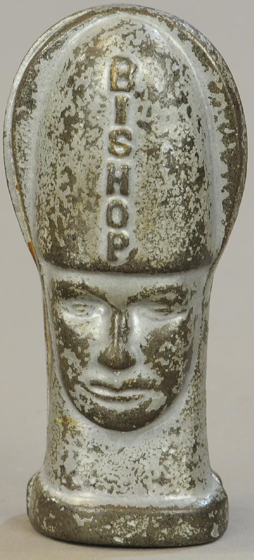 BISHOP BUST STILL BANK: 1295. BISHOP BUST STILL BANK | 4.5" h. | We have not handled this bank before, likely from a small Midwest foundry, possibly of newer vintage. | $50 - $100