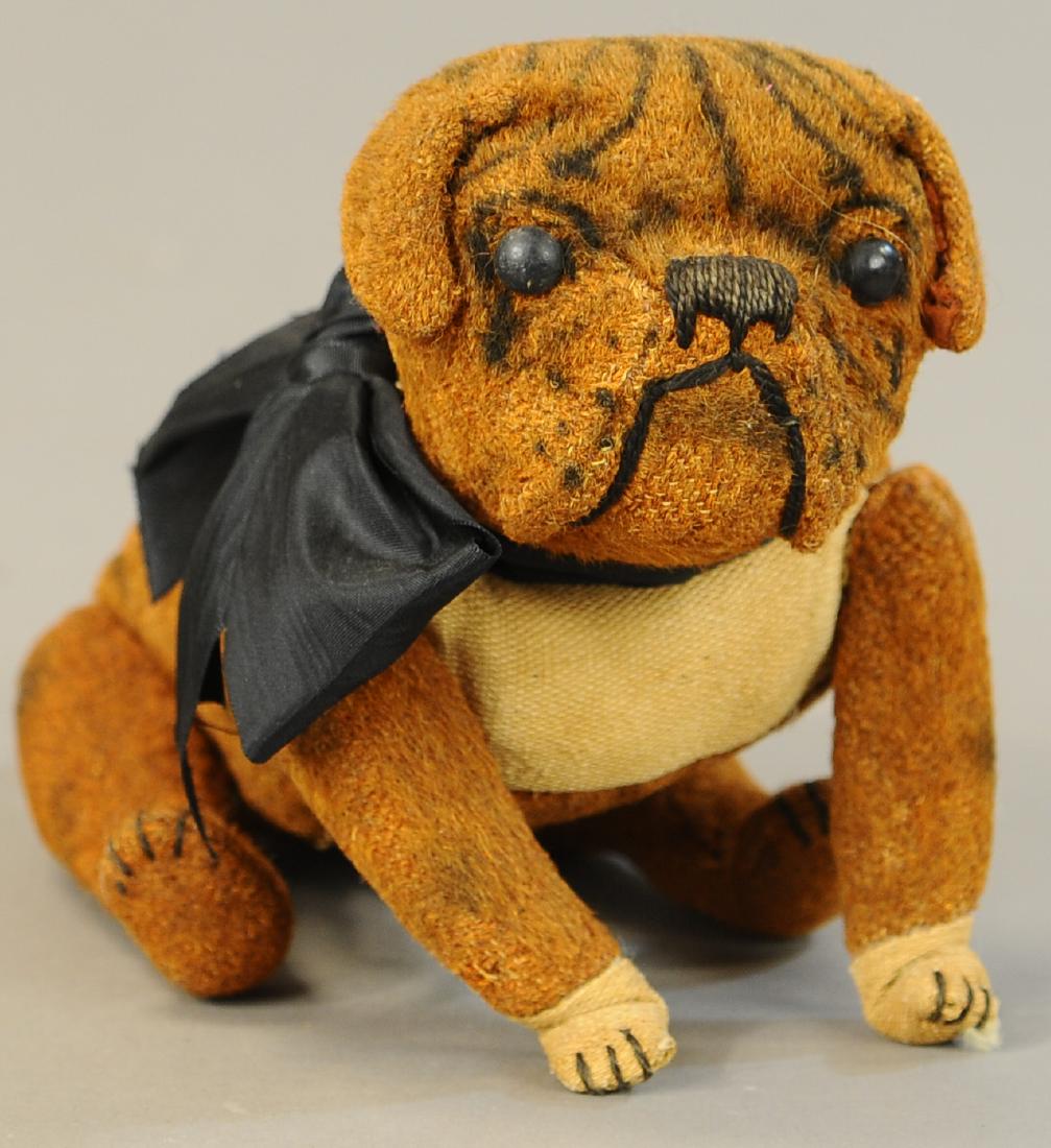 STEIFF TIGE BULL DOG: 1321. STEIFF TIGE BULL DOG | Buster Brown's dog, Tige, missing mohair on chest and feet, face, however, is very nice. | 9" | (Fair-Good Cond.) | $75 - $150