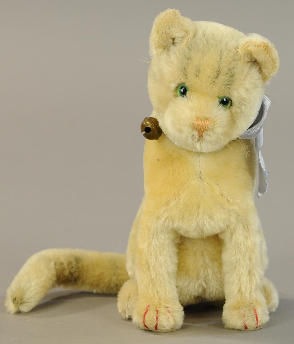 STEIFF MECHANICAL TURN TAIL CAR: 1334. STEIFF MECHANICAL TURN TAIL CAR | Rare and desirable form with block letter trailing f button, mohair (Near Mint Cond.) | 9" h. | All Original Condition. | $200 - $400