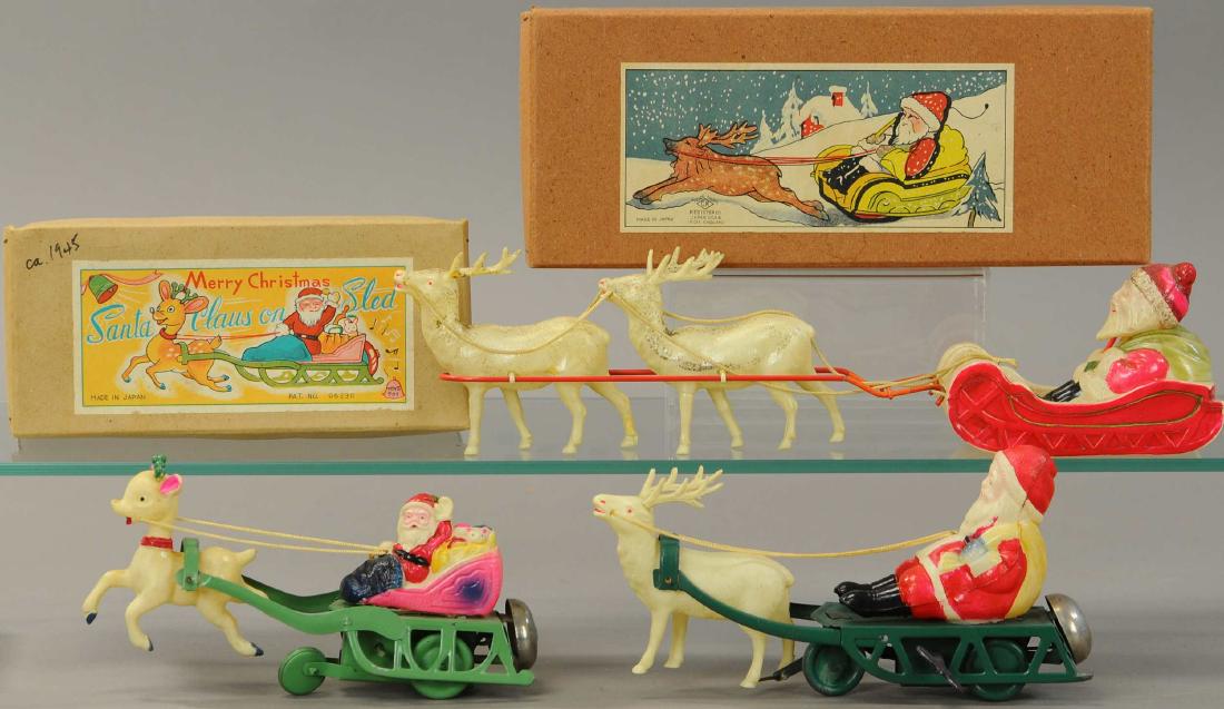 THREE CELLULOID SANTA REINDEER SLEIGH TOYS: 54. THREE CELLULOID SANTA REINDEER SLEIGH TOYS | 9.5" l. | One Santa sleigh is cracked and re-glued, otherwise other two in All Original Condition. | $200 - $400