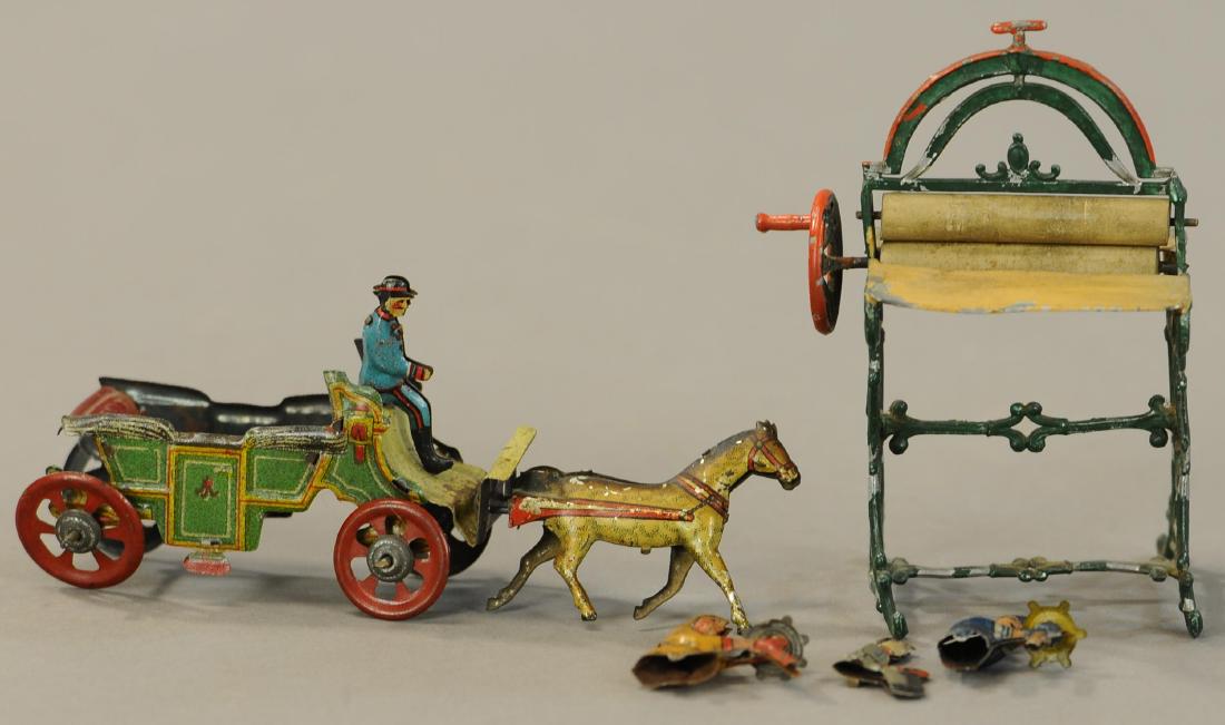 MANGLE & LOOSE PENNY TOY PARTS: 82. MANGLE & LOOSE PENNY TOY PARTS | 4" h. | Sold as is for parts. | $75 - $150