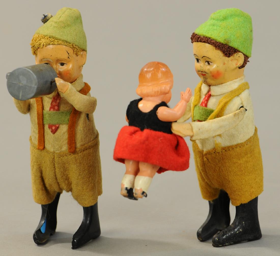 TWO SCHUCO BAVARIAN BOY TOYS: 102. TWO SCHUCO BAVARIAN BOY TOYS | 5.25" h. | All Original Condition. | $200 - $400