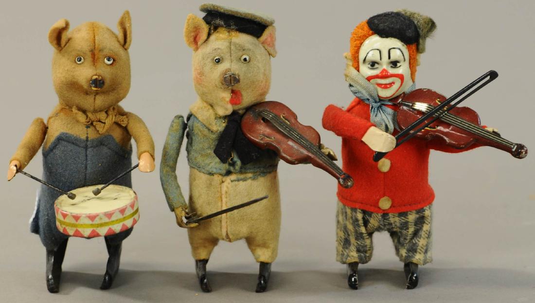 THREE SCHUCO MUSICIANS - PIGS/CLOWN: 105. THREE SCHUCO MUSICIANS - PIGS/CLOWN | 4.5" h. | All Original Condition. | $250 - $500