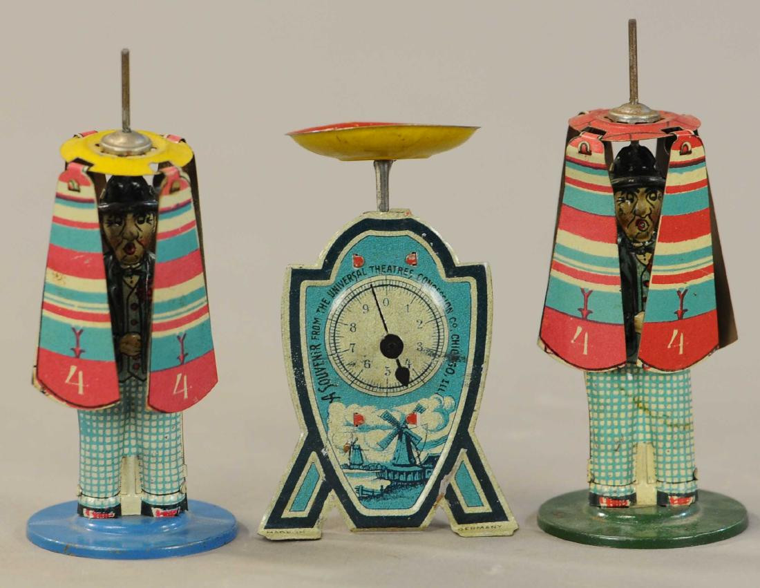 LOT OF THREE NOVELTY PENNY TOYS: 111. LOT OF THREE NOVELTY PENNY TOYS | 5" h. | All Original Condition. | $75 - $150