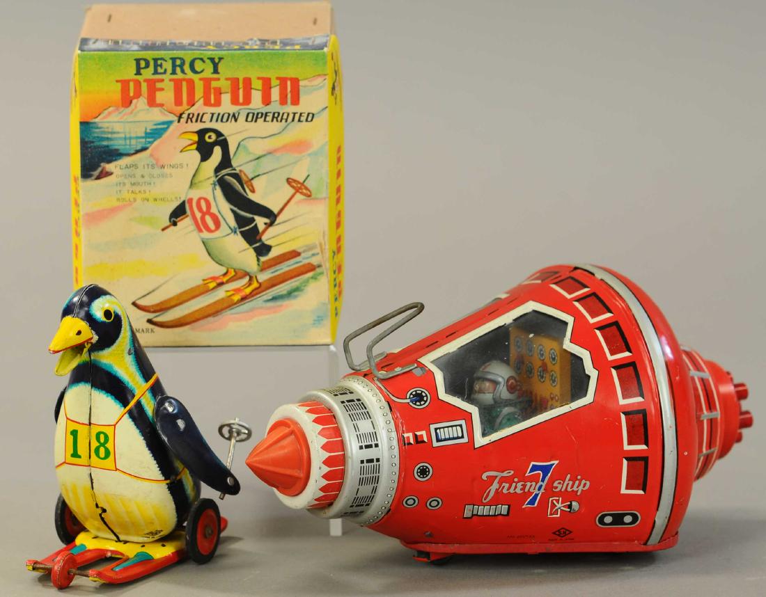TWO JAPANESE TIN TOYS - SPACESHIP/PENGUIN SKIER: 129. TWO JAPANESE TIN TOYS - SPACESHIP/PENGUIN SKIER | 9.5" h. | Factory touch ups to edge of red spaceship, otherwise in All Original Condition. | $200 - $400