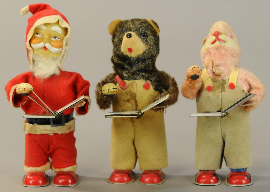 THREE WIND-UP FIGURAL TOYS: 131. THREE WIND-UP FIGURAL TOYS | 7.5" h. | Rabbit wind-up needs adjustment, otherwise in All Original Condition. | $200 - $400