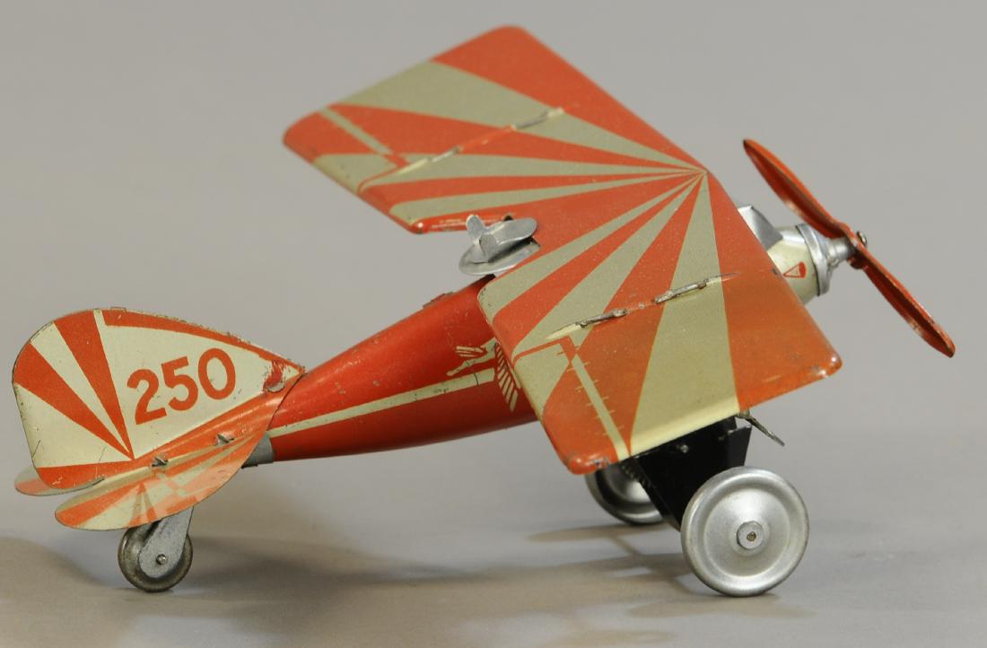 JEP FRANCE #25 MONOCOUPE PLANE: 132. JEP FRANCE #25 MONOCOUPE PLANE | Provenance: Donald Kaufman Collection. | 11" l. | All Original Condition. | $300 - $600