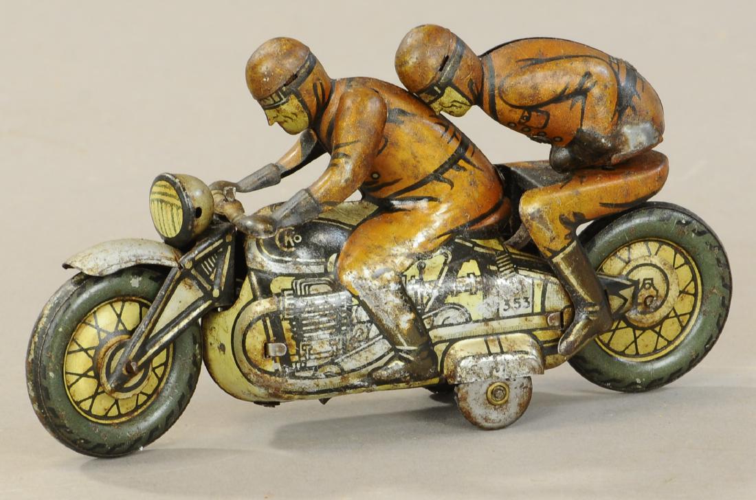 CKO MOTORCYCLE WITH DOUBLE RIDERS: 154. CKO MOTORCYCLE WITH DOUBLE RIDERS | 5.5" l. | Oxidation to lithography is even throughout. | $200 - $400