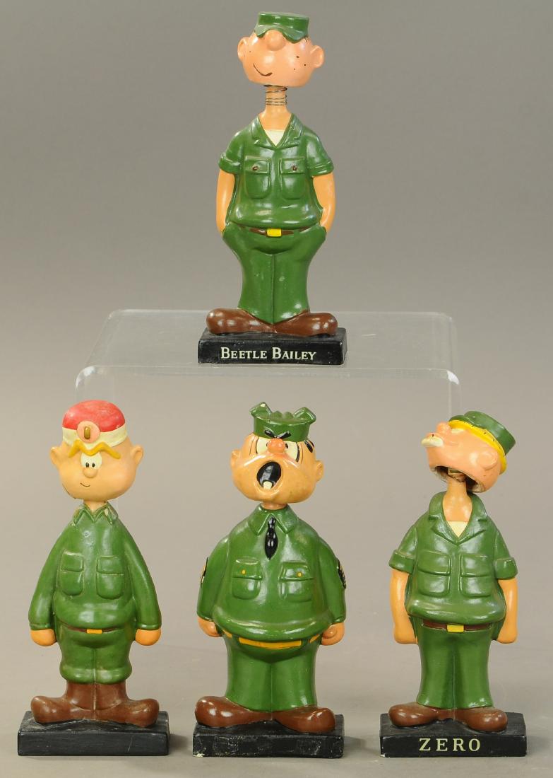 LOT OF 4 BEETLE BAILY COMIC CHARACTER BOBBLEHEADS: 166. LOT OF 4 BEETLE BAILY COMIC CHARACTER BOBBLEHEADS | 7.5" h. | Very minor chipping to some edges, All Original Condition. | $200 - $400