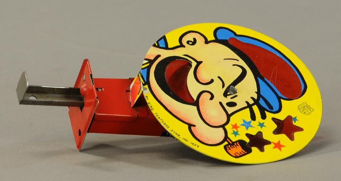 CHEIN POPEYE CIRCULAR SPARKLER: 184. CHEIN POPEYE CIRCULAR SPARKLER | 5.25" l. | Sparkler is working, but missing sparkler flint, otherwise All Original Condition. | $50 - $100