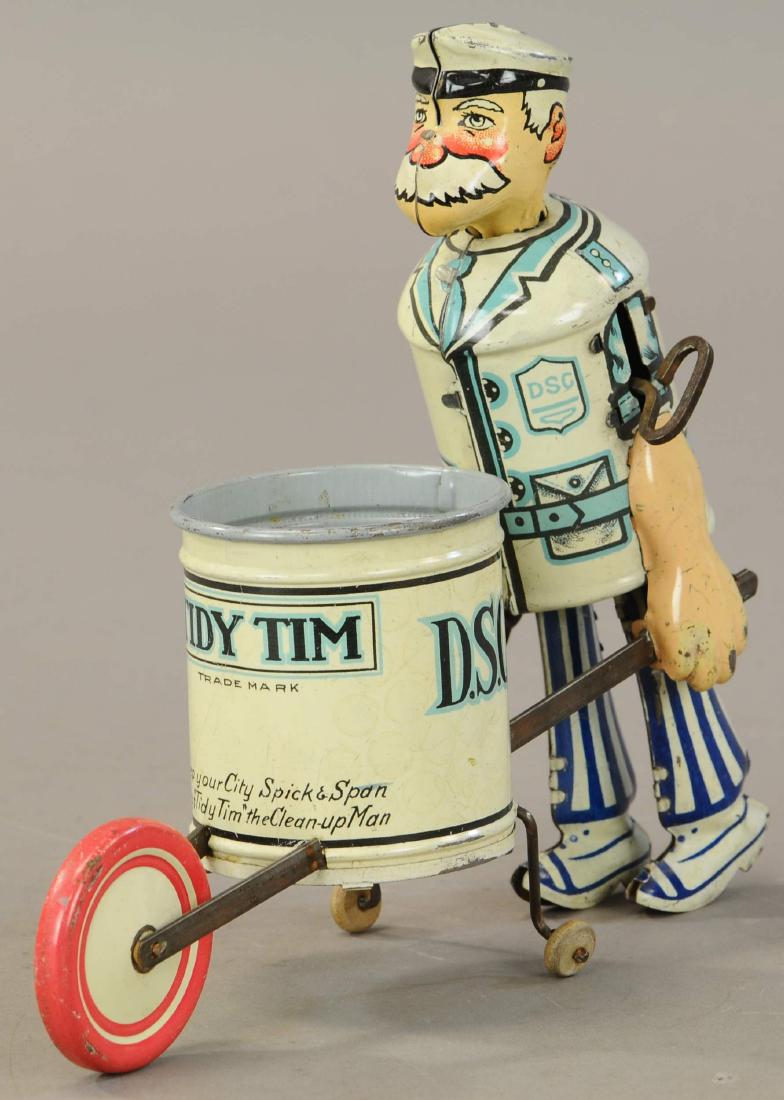 MARX TIDY TIM - RED WHEELS: 305. MARX TIDY TIM - RED WHEELS | 8" h. | Wind-up is working but leg post needs adjustment to walk properly, otherwise tin in All Original Condition. | $200 - $400