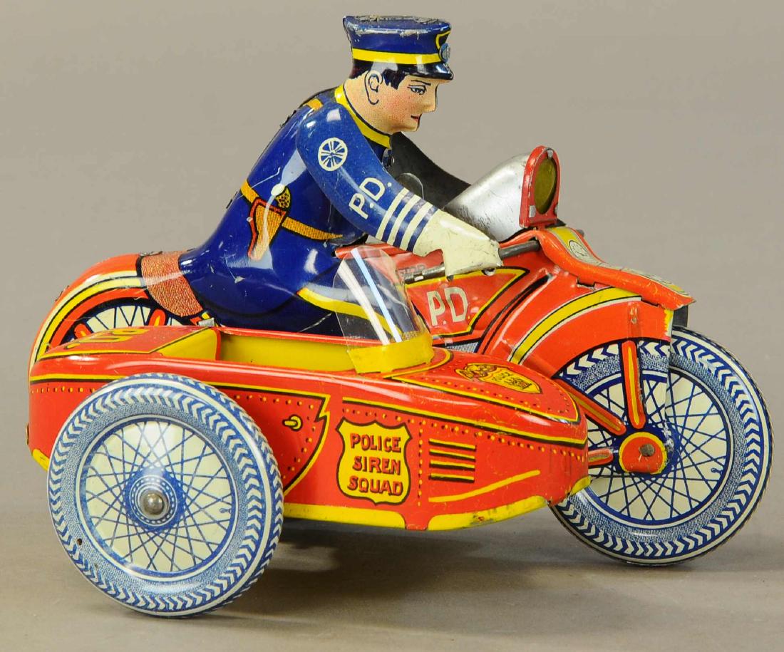 MARX SPARKLING POLICE CYCLE W/ SIDECAR - RED: 342. MARX SPARKLING POLICE CYCLE W/ SIDECAR - RED | 8" h. | All Original Condition. | $150 - $300