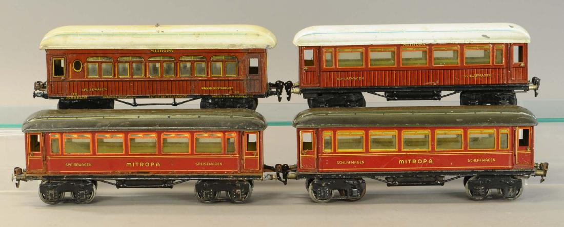 PRE-WAR MARKLIN PASSENGER CARS: 393. PRE-WAR MARKLIN PASSENGER CARS | 1 gauge. | 13" | One door replaced, some minor touch-ups to frame of one car. Two cars missing steps, otherwise (VG Cond.) | $300 - $600