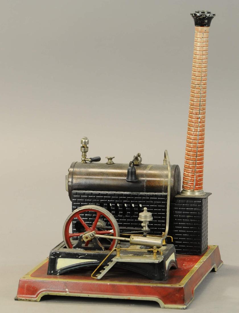 DOLL BURNISHED BOILER STEAM ENGINE: 435. DOLL BURNISHED BOILER STEAM ENGINE | circa 1935, rare combo engine having Bing fire box, Fleischmann piston assembly with flyball governor with drive band, original Doll burner and 10" stack, wat