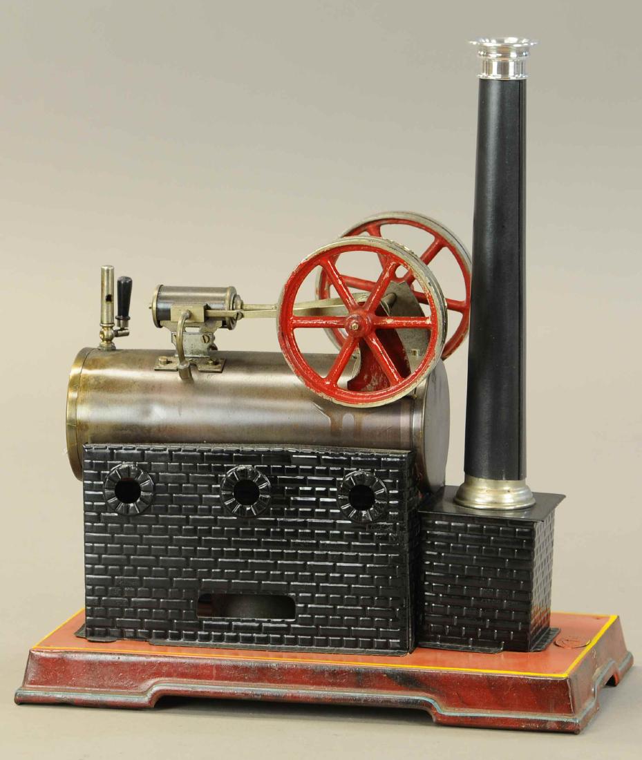 JF JON FALK OVERTYPE LOCOMOBILE STEAM ENGINE: 437. JF JON FALK OVERTYPE LOCOMOBILE STEAM ENGINE | circa 1925, Burnished boiler twin 3.5" flywheels, brickwork firebox with three holes, water sight glass, whistle, pressure filler valve burner, box 