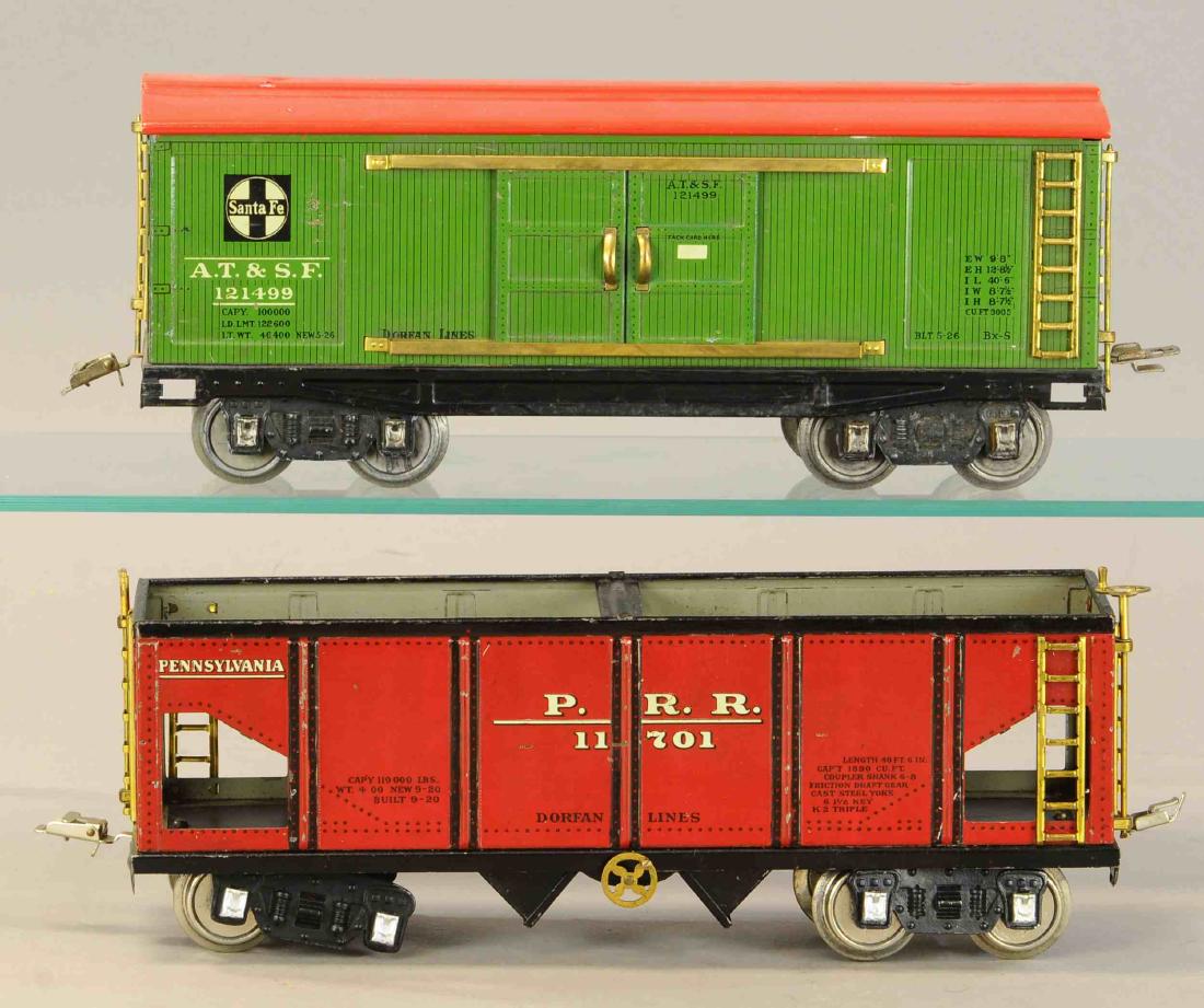 PAIR OF DORFAN FREIGHT CARS: 503. PAIR OF DORFAN FREIGHT CARS | Standard gauge. | 13" l. | Hopper is missing one pair of wheels, otherwise | $150 - $300