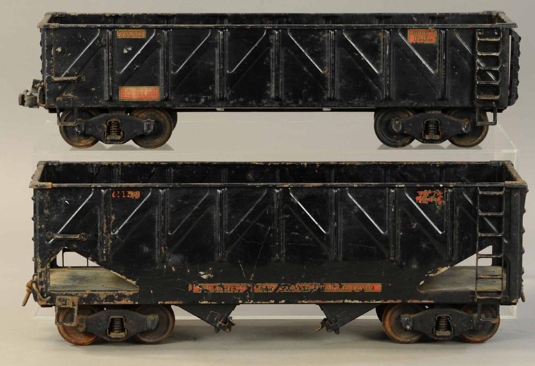 BUDDY L OUTDOOR RR GONDOLA & COAL HOPPER: 534. BUDDY L OUTDOOR RR GONDOLA & COAL HOPPER | 21" l. | Missing couplers, paint in All Original Condition. | $200 - $400