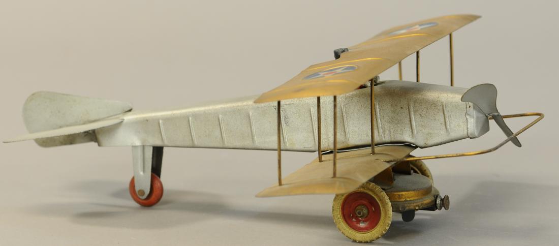 KINGSBURY BI-WING PLANE: 556. KINGSBURY BI-WING PLANE | Provenance: Donald Kaufman Collection. | 16" l. | All original (Pristine Condition) | $400 - $800