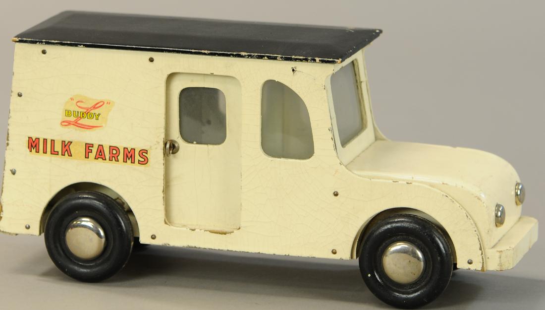 BUDDY L WOODEN MILK FARM TRUCK: 569. BUDDY L WOODEN MILK FARM TRUCK | 13.5" l. | Minor edge wear and chipping, All Original Condition. | $250 - $500