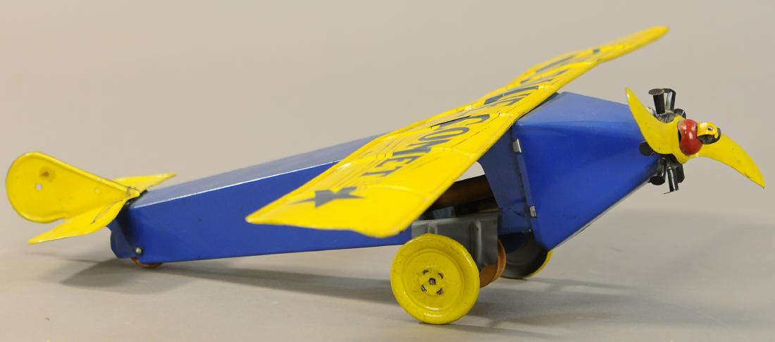 RARE KATZ TOYS BLUE COMET AIRPLANE: 578. RARE KATZ TOYS BLUE COMET AIRPLANE | Provenance: Donald Kaufman Collection. | 18" w. | String from axle to propeller needs to be added, tin in All Original Condition. | $500 - $1,000