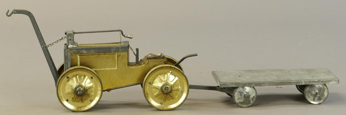UNUSUAL AMIDTAT TRACTOR TOY: 652. UNUSUAL AMIDTAT TRACTOR TOY | 12" l. | Rubber treads are missing, otherwise appears complete and original. | $400 - $800