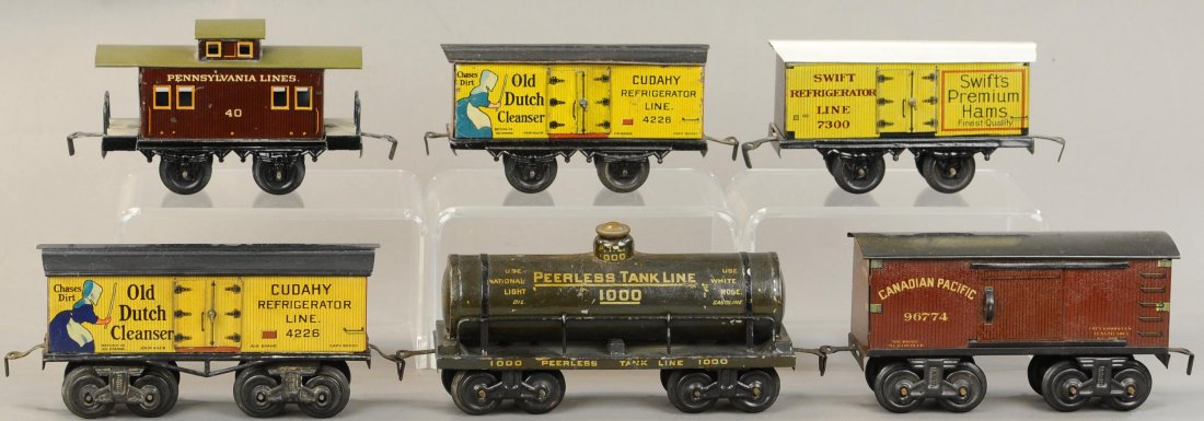 SIX BING FREIGHT CARS - DUTCH CLEANSER: 391a. SIX BING FREIGHT CARS - DUTCH CLEANSER | All 0 gauge, two wheel ans eight wheel versions. | All Original Condition. | $400 - $800