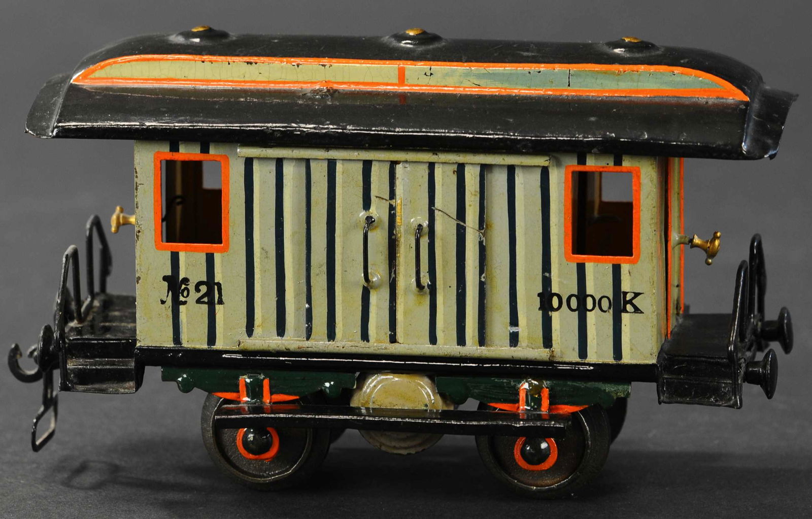 MARKLIN BAGGAGE CAR: 20. MARKLIN BAGGAGE CAR | Hand painted, Gauge 1, circa 1900, catalog #1823/1, baggage car with two sliding doors on either side, features opening doors at either end leading to platform, steps and rai