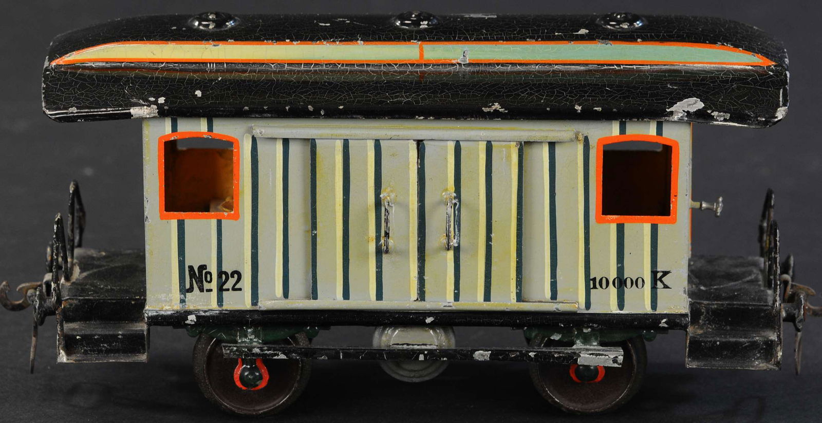 MARKLIN GAUGE 2 LUGGAGE CAR: 54. MARKLIN GAUGE 2 LUGGAGE CAR | Hand painted, Gauge 2, circa 1900, baggage car to compliment any lineup of coaches, early loop couplers, cast iron wheels, air tank and running boards, impressive car