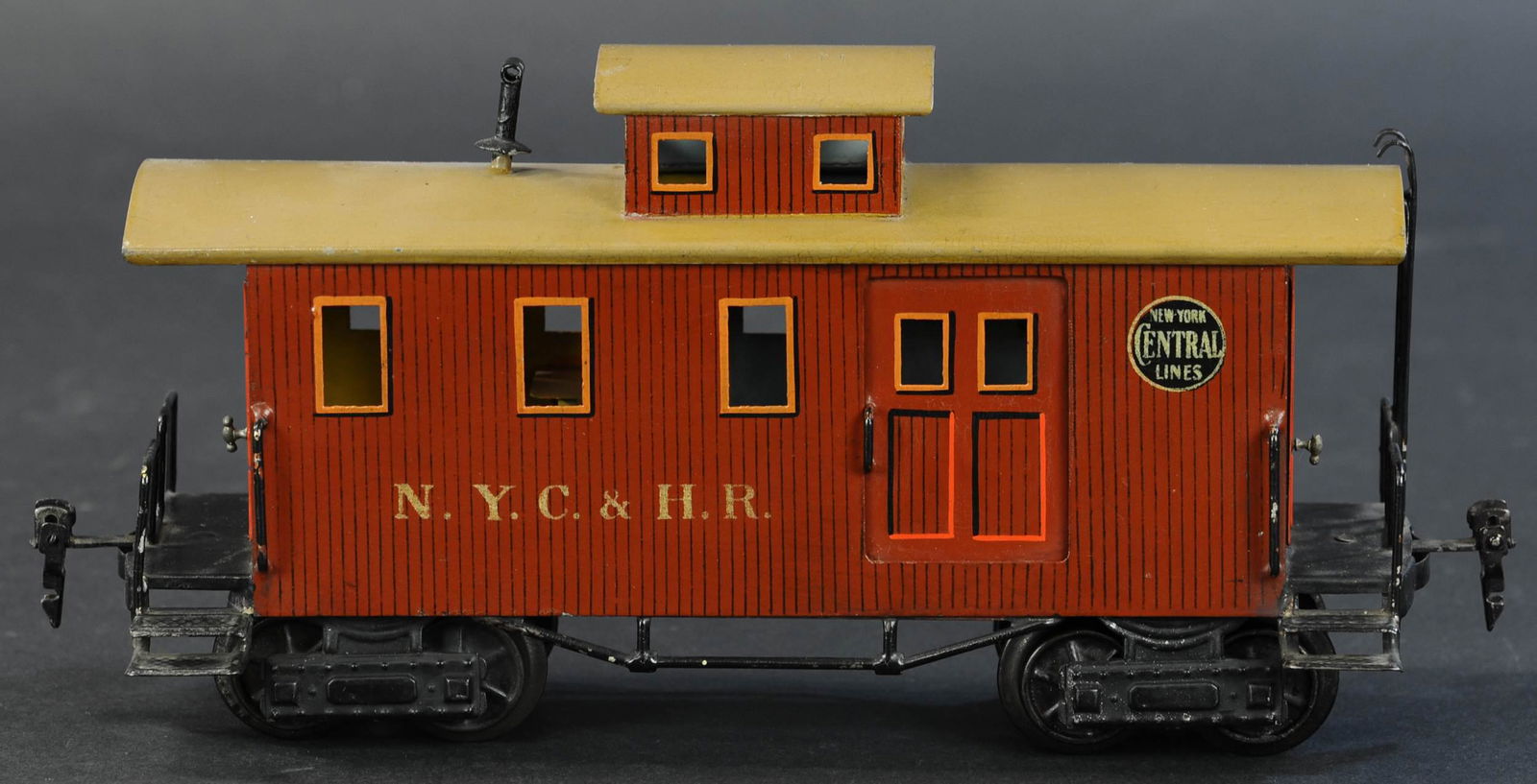 MARKLIN NEW YORK CENTRAL CABOOSE: 63. MARKLIN NEW YORK CENTRAL CABOOSE | Hand painted, gauge 1, impressive hand painted eight wheel caboose made only for the American market, features opening doors, stove pipe on roof from wood stove,
