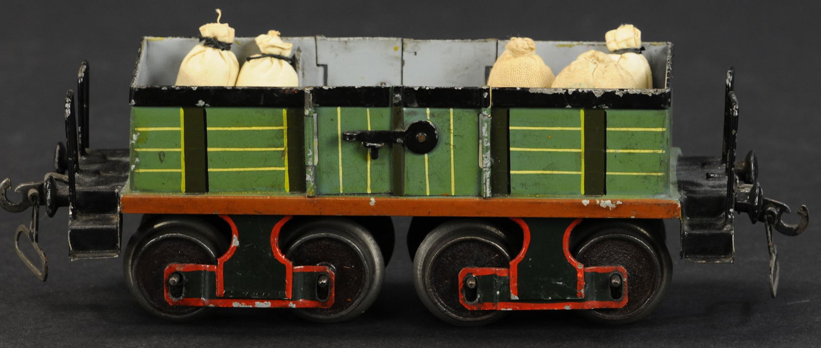 EARLY MARKLIN GONDOLA: 110. EARLY MARKLIN GONDOLA | Hand painted, Gauge 1, early version with cast iron wheels and drop loop coupler. | 8" length. | (Excellent Condition) | $400 - $600