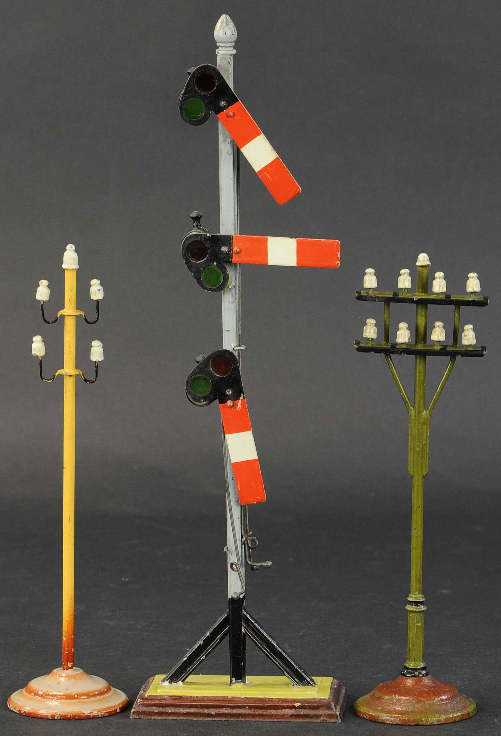 MARKLIN SEMAPHORE AND TELEGRAPH POSTS: 152. MARKLIN SEMAPHORE AND TELEGRAPH POSTS | 10.5" - 15.5" height. | (Excellent Condition) | $300 - $400