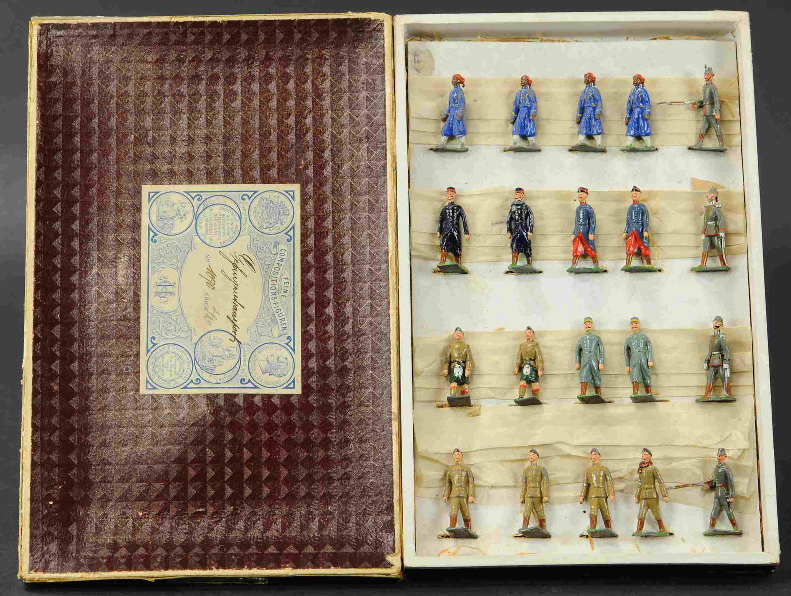 HEYDE EUROPEAN OFFICERS & AIDES: 186. HEYDE EUROPEAN OFFICERS & AIDES | Solid cast, Turacos, Belgium, French, Germany, English troops marching. | 48mm. | Box wear on corners & reinforced, figures (Good to Very Good Condition) | $250