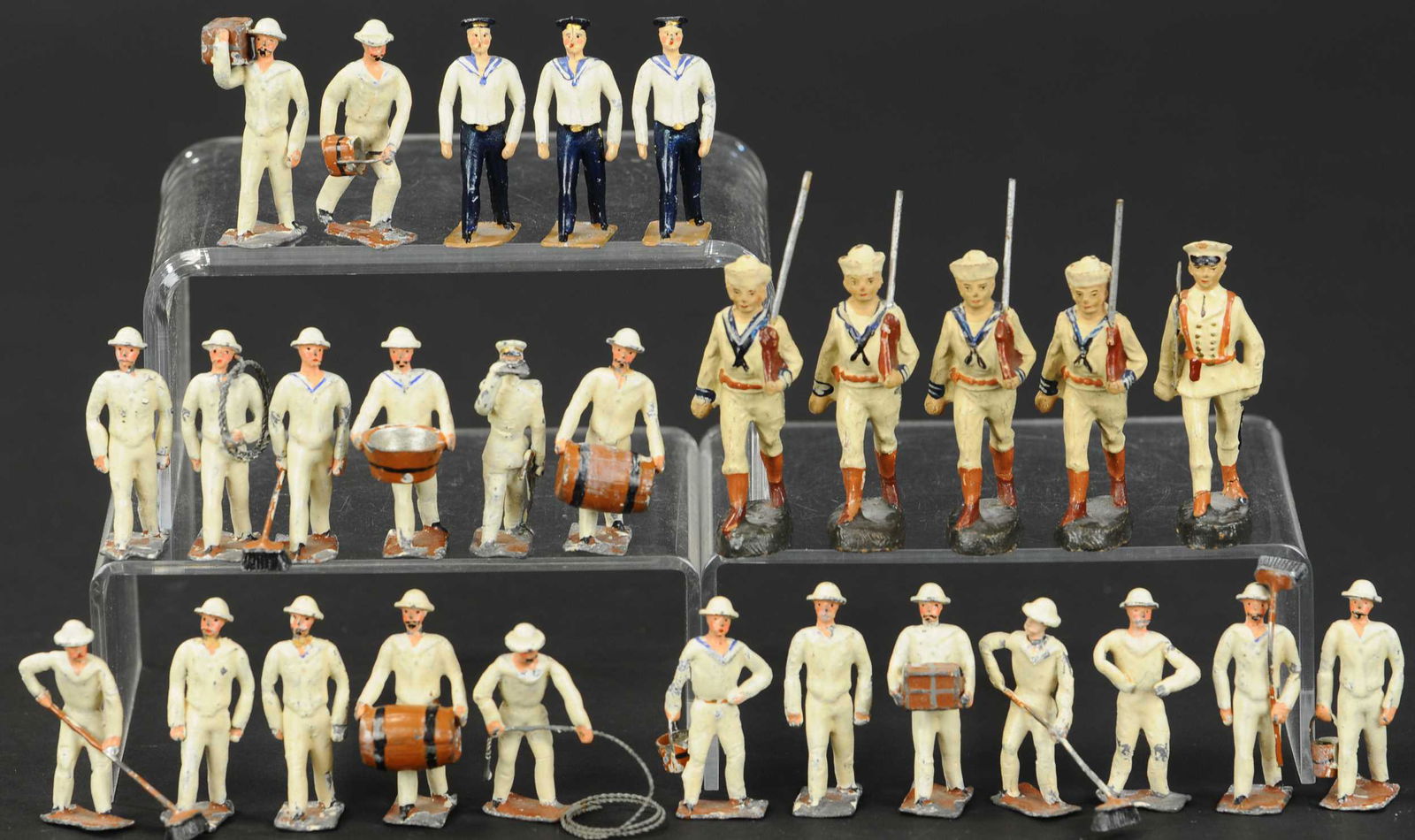 NAUTICAL SAILORS GROUPING: 237. NAUTICAL SAILORS GROUPING | Twenty-eight nautical sailor figures which include post-war Elastolin, Heyde & Elastolin. | 2"-3" high. | (Excellent to Pristine Condition) | $300 - $500