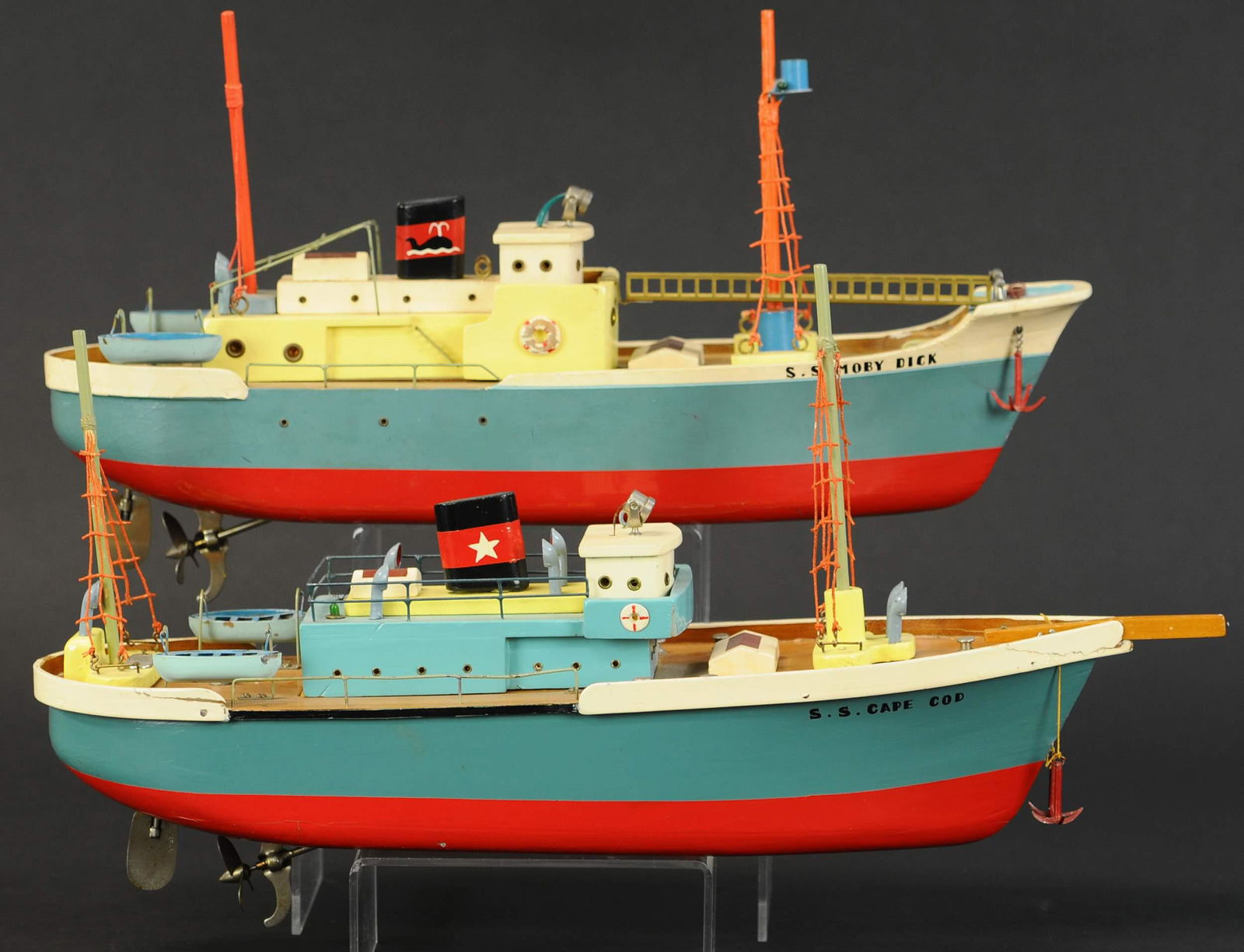 TWO ITO JAPAN WORKING VESSLES: 251. TWO ITO JAPAN WORKING VESSLES | SS Cape Cod and SS Moby Dick, manual rudders, top of boat removes to access the battery operated motors, Moby Dick motor is marked "TMY" and Cape Cop motor is mark