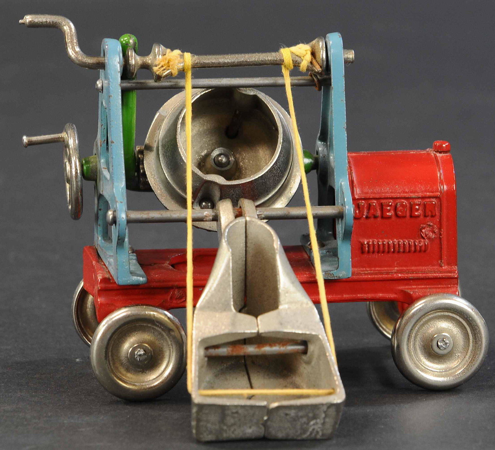 KENTON SMALL JAEGER CEMENT MIXER: 279. KENTON SMALL JAEGER CEMENT MIXER | Kenton, Ohio, beautiful toy with great color combination of blue and red with green accent, nickeled wheels accent the toy well. | 6" length. | (Pristine to Nea