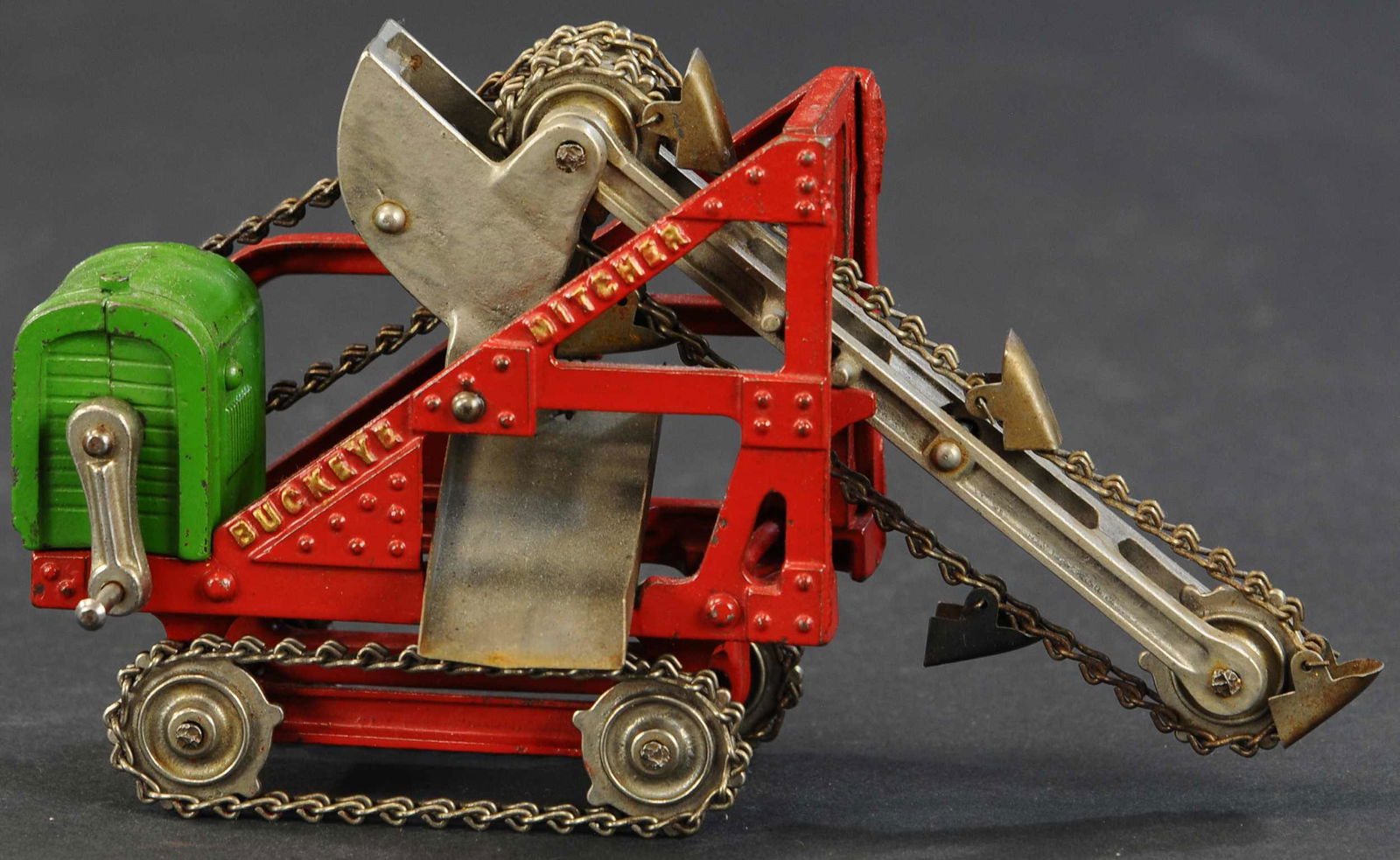 KENTON RED BUCKEYE DITCHER: 281. KENTON RED BUCKEYE DITCHER | Kenton, Ohio, a popular construction toy from the Midwest in original condition. | 9.25" length. | (Excellent Condition) | $600 - $800