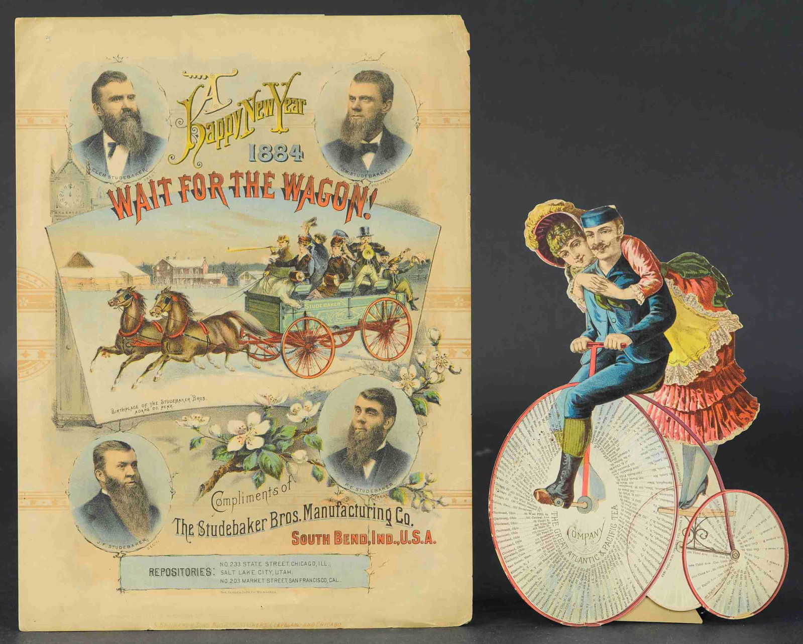 TWO EARLY LITHO ADVERTISING ITEMS: 366. TWO EARLY LITHO ADVERTISING ITEMS | Poster for Studebaker wagons and an A & P store, high wheeler advertising die-cut w/some creasing to heads and wheel. | Wagon ad 14", bicycle 10" height. | (Go