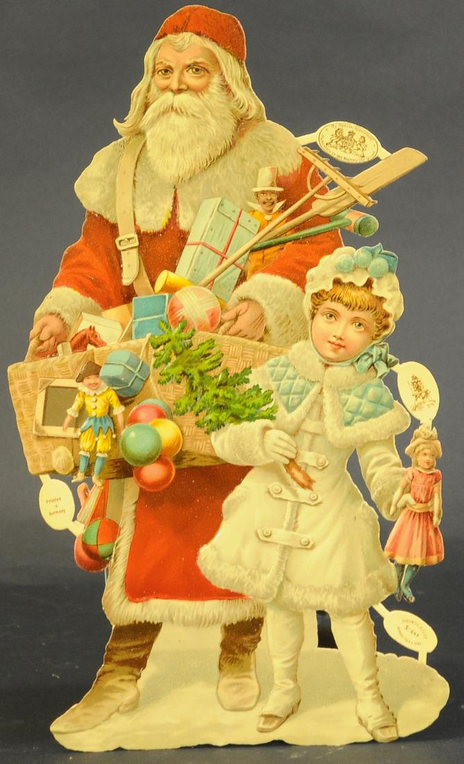 LARGE & COLORFUL SANTA CLAUS DIE-CUT: 570. LARGE & COLORFUL SANTA CLAUS DIE-CUT | A Raphael Tuck, "Gigantic Relief" image of Santa with little girl holding basket full of wonderful toys. | 15" high. | (Excellent Condition) | $300 - $500