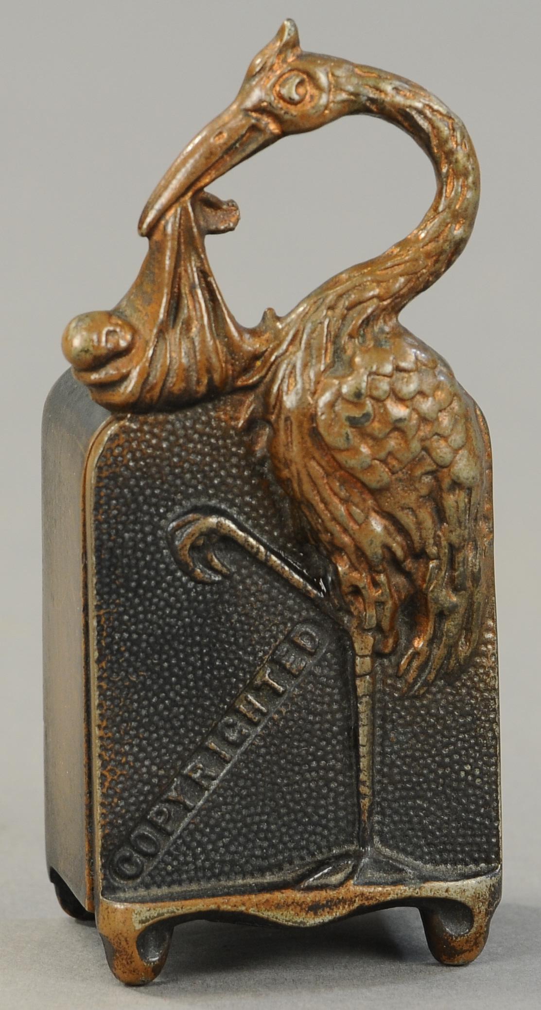 HARPER STORK STILL BANK: 2. HARPER STORK STILL BANK | 5.25" h. | Crack at corner of safe, (Exc. Cond.) | $400 - $600